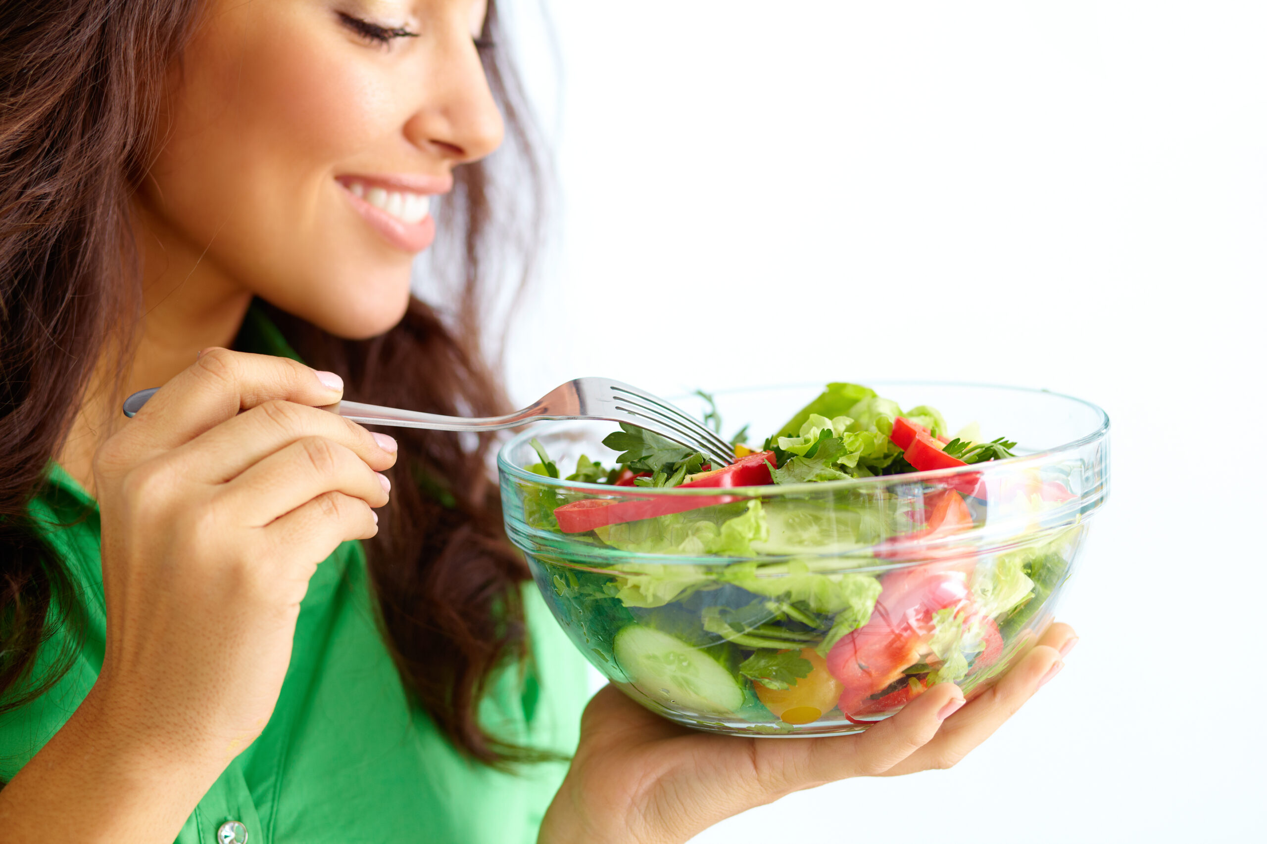close up,of,pretty,girl,eating,fresh,vegetable,salad
