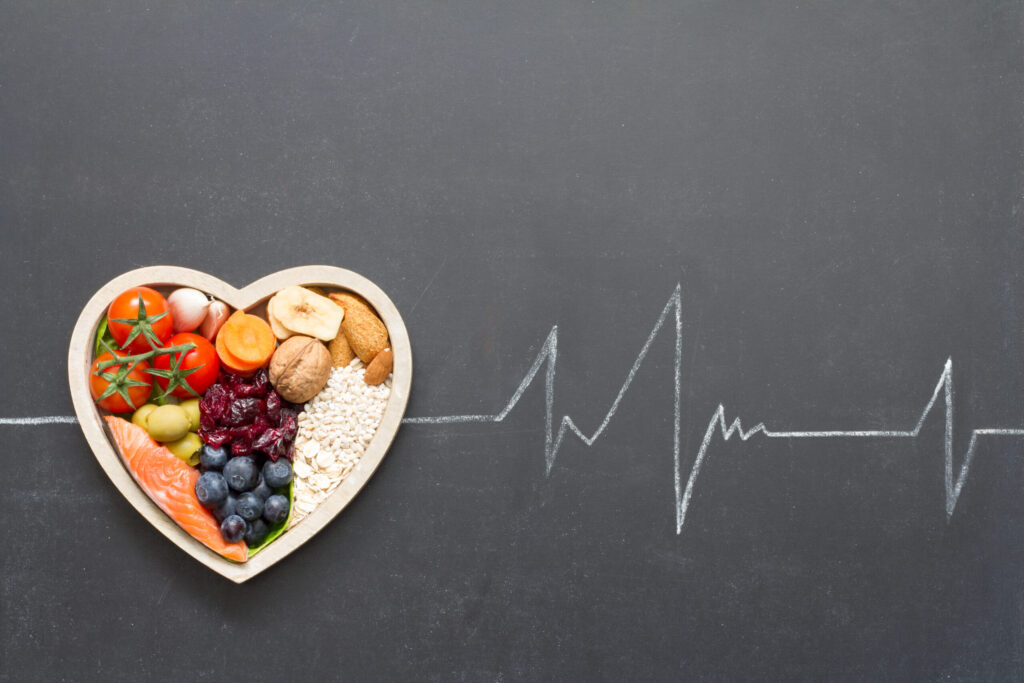 healthy,food,in,heart,and,cardiograph,on,blackboard,medical,abstract